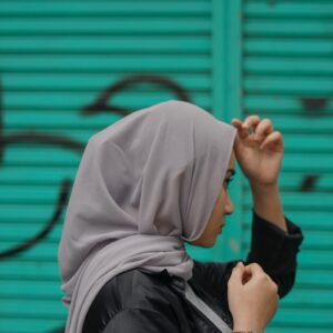 person in white hijab and black long sleeve shirt